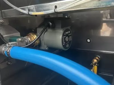 Boost pump fitted to a Nilfisk 400HS DTE pressure washer to ensure consistent inlet water pressure. Helps protect the main pump, prevent cavitation, and improve overall performance and reliability.